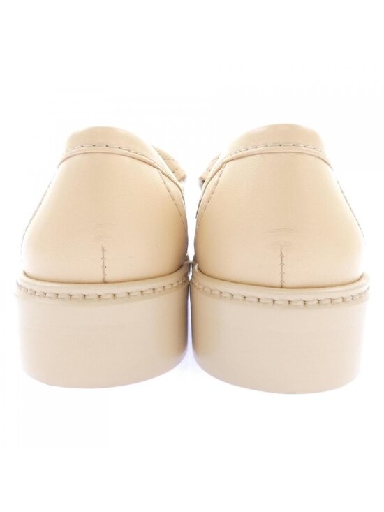 Chanel NEW White CC Logo Flats Silver Turnlock Moccasins  Chanel Turnlock Moccasins Shoes